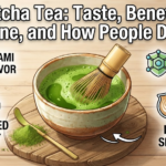 Ceremonial matcha green tea powder whisked into a frothy bowl with a bamboo whisk and scoop.